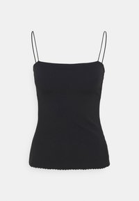 Black camisole with thin adjustable straps, featuring a fitted design and a scalloped hem. Smooth texture and minimalist aesthetic.