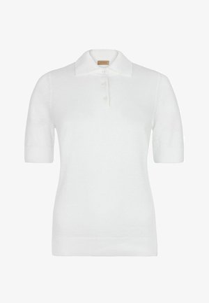 Polo blanc à manches courtes avec trois boutons et un col classique, fabriqué en tissu tricoté texturé.