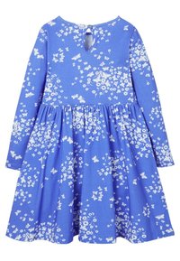 Niebieska sukienka z długim rękawem w białe kwiatowe i motylkowe wzory. Zapięcie na plecach w kształcie dziurki oraz marszczona spódnica. Miękki materiał bawełniany.