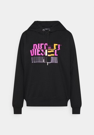 Sweat à capuche noir avec cordons, présentant un texte audacieux et déformé "DIESEL" en rose et jaune, avec un slogan plus petit en dessous.