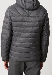 Gray puffer jacket with horizontal stitching, a hood, and high collar. Features a smooth, shiny texture and a small brand logo on the shoulder.