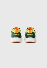 Green and yellow athletic shoes with a textured mesh upper, orange accents, and white soles featuring KangaROOS branding on the heel.