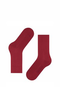Rote Baumwollsocken mit glatter Textur, regulärer Länge und verstärkter Zehenpartie. Mit einem "R"-Symbol für den rechten Socke.