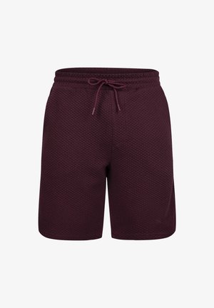 Bordeauxfarbene Shorts mit einem strukturierten Muster, ausgestattet mit einem elastischen Bund und einem verstellbaren Kordelzug. Leichtes Material für zusätzlichen Komfort.