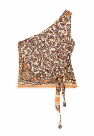 Haut beige à une épaule avec motif paisley orange et marron, lien sur le côté avec longues franges, et détail d'ourlet festonné.