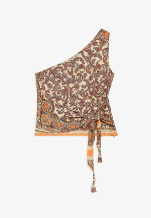 Haut beige à une épaule avec motif paisley orange et marron, lien sur le côté avec longues franges, et détail d'ourlet festonné.