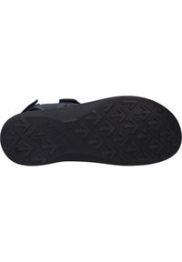 Černá gumová podešev boty s viditelným vzorem a směrovými šipkami; označeno "JOSEF SEIBEL" a gumovou strukturou pro lepší grip.