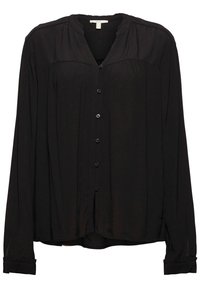 Chemise noire à boutons, fabriquée dans un tissu doux et lisse. Dispose de manches longues avec poignets boutonnés et d'une coupe décontractée. Détail notable de coutures sur les épaules.