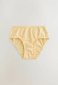 Gele katoenen damesonderbroek met een witte bloemenpatroon, kantafwerking en een klein witte strikdetail op de tailleband. Zachte textuur, volledig dek ontwerp.