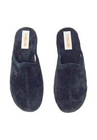 Pantofole in suede nero con retro aperto, dotate di una soletta imbottita e un marchio sottile arancione su un'etichetta bianca. Texture liscia.