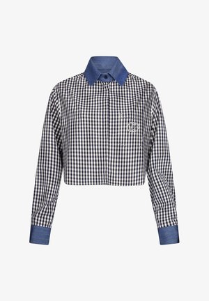 Camicia cropped con bottoni, caratterizzata da un motivo a quadretti bianco e blu navy, colletto e polsini in denim, maniche lunghe e taschino sul petto.