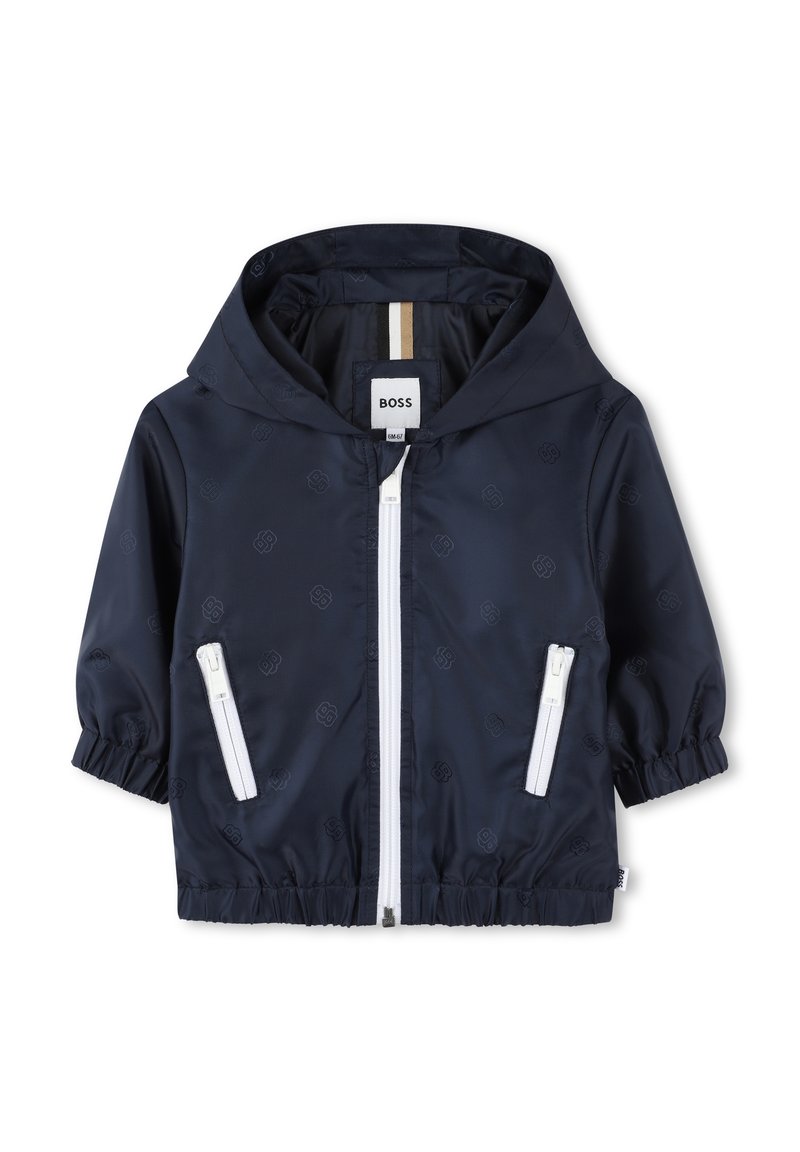 Navy zip-up jacket with a hood, featuring white zippers, elastic cuffs, and a subtle embossed logo pattern throughout.