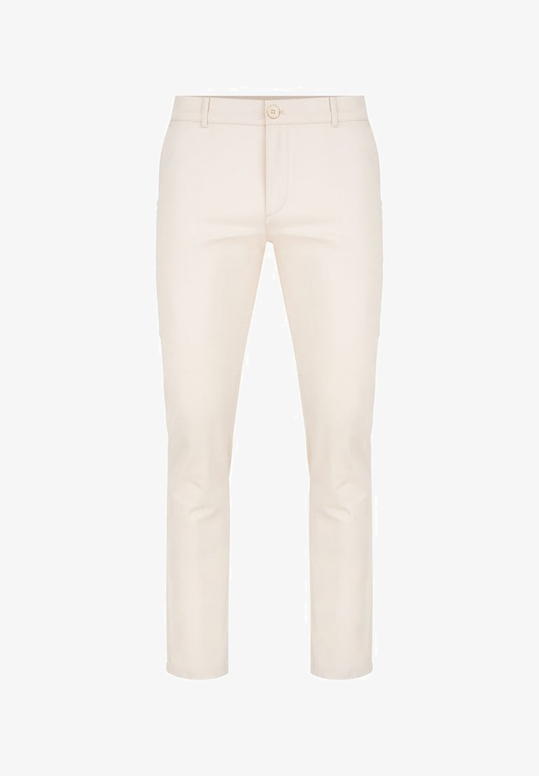 Beżowe spodnie o dopasowanym kroju, wykonane z gładkiego materiału. Posiadają zapięcie na guzik z przodu, szlufki na pasek oraz subtelne detale szwów.