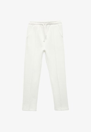 Pantalones de chándal de algodón blanco con cintura elástica, cordón y dos bolsillos laterales. Presenta costuras planas y un diseño de pierna recta.