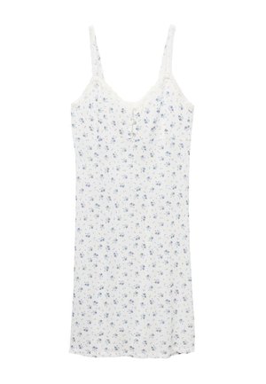 Chemise de nuit florale en tissu léger, présentant une base blanche avec des motifs floraux bleus, des bretelles fines et une dentelle le long de l'encolure.