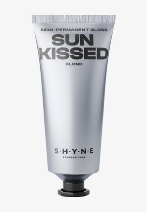Silberne Tube mit semi-permanentem Glanz, beschriftet mit "Sun Kissed Blond", zeigt eine kräftige schwarze Typografie und einen schwarzen Drehverschluss.