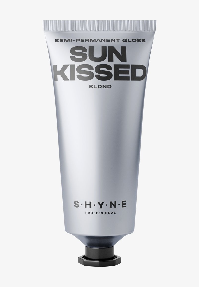Srebrna tubka półtrwałego połysku, oznaczona napisem „Sun Kissed Blond”, z wyraźną czarną typografią i czarną zakrętką na zakręcanie.