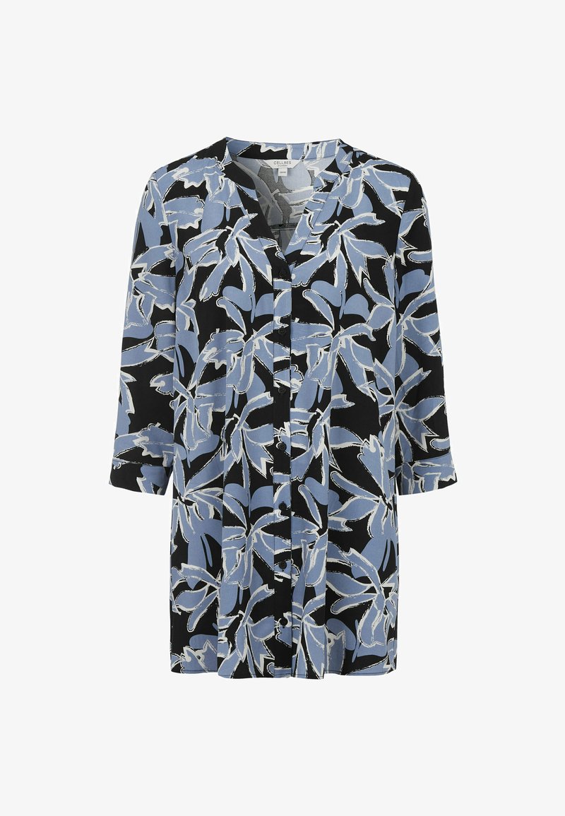 Langærmet skjorte med en sort stofbund og blå samt hvide blomster mønstre, knaplukning og v-halsudskæring.