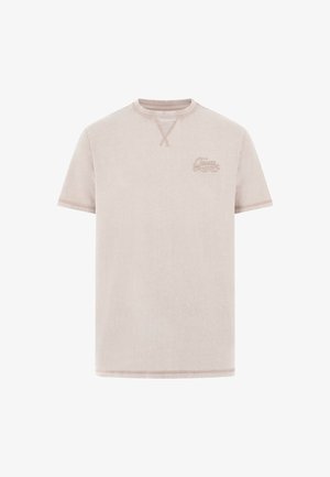 Lichtbeige T-shirt met korte mouwen, ronde hals en een klein reliëf Guess-logo op de linkerborst.