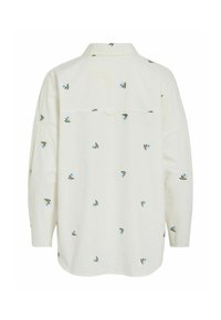 Chemise blanche à manches longues avec petite broderie florale bleue, col classique et coupe ample, vue de dos.