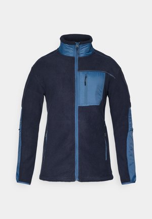 Navy fleece jas met blauwe nylon accenten, volledige rits, hoge kraag, ritsborstzak en twee zijzakken. Zachte textuur overal.