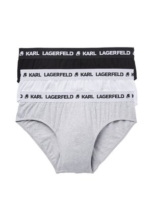 Tre herretrusser i sort, hvid og grå, hver med en mærket taljebånd med teksten "KARL LAGERFELD" og en silhuetlogo.