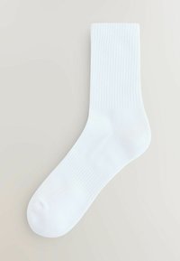 Weiße Baumwollsocke mit gerippter Gestaltung am oberen Rand, abgerundeter Zehenpartie und glatter Textur. Keine sichtbaren Muster oder zusätzlichen Akzente.