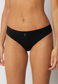 Black hipster panties with a smooth finish, featuring a minimalist design and a small, subtle logo detail at the front center.