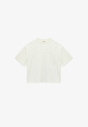 Witte T-shirt met korte mouwen, gemaakt van zachte stof, met verspreide zwarte versieringen. Boxy snit met een ronde hals.