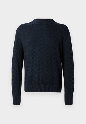 Dark navy knitted sweater with a textured wave pattern, ribbed neckline, and cuffs. Fitted design with long sleeves and a classic shape.