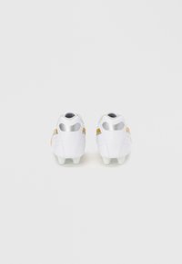 White football cleats with gold accents and silver hardware. The design features a textured surface and a snug fit, ideal for performance.