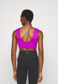 Athleta AURORA U NECK MUSCLE BRA A-C - Sutiã desportivo de suporte ligeiro - jazzy purple