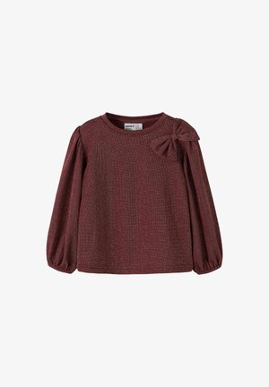 Burgunderfarbendes Langarmshirt mit Rundhalsausschnitt, strukturiertem Stoff und einer Schleifen-Akzent auf der linken Schulter. Puffärmel erzeugen einen gerafften Effekt.