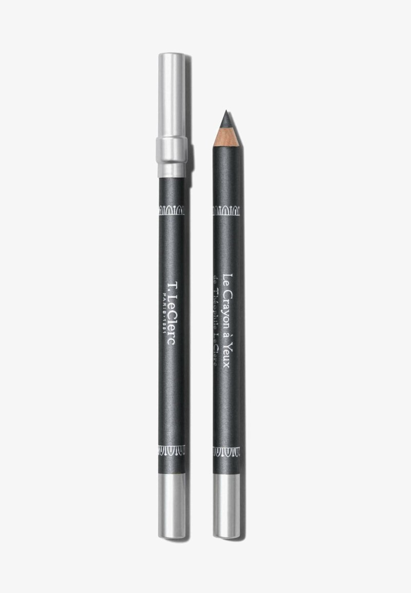 Crayon pour les yeux noir avec un capuchon argenté, présentant une forme cylindrique élégante et un texte blanc détaillé. Texture lisse, pointe fine pour la précision.