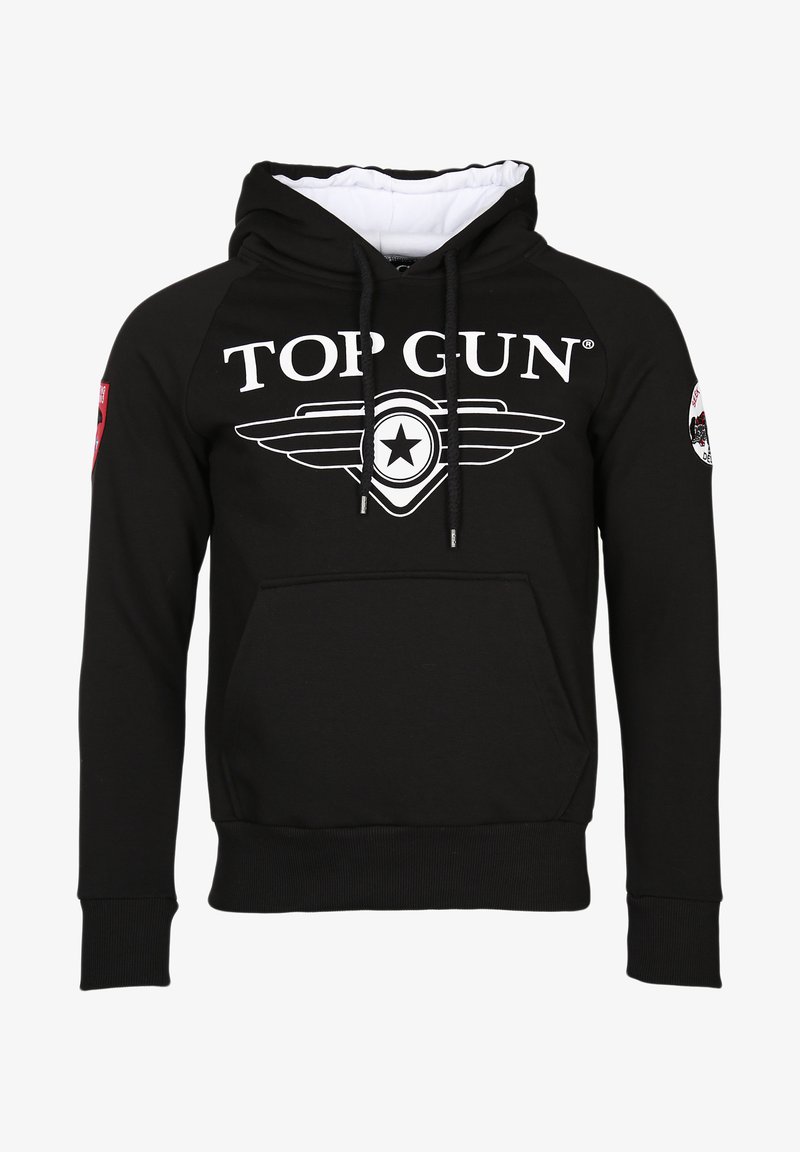 Musta huppari, joka on valmistettu puuvillasekoitteesta. Siinä on suuri valkoinen "TOP GUN" -logo ja siipigrafiikka, etutasku ja punaiset hihasovitteet.