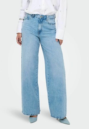 MIT WEITEM BEIN CARINA HOHE TAILLE WEITER  - Flared Jeans - light blue denim