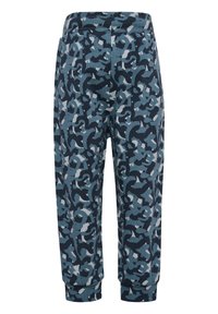 Blå mönstrade joggingbyxor med ett kamouflage-mönster i nyanser av marinblått, ljusblått och grått; elastisk midja och åtsittande muddar.