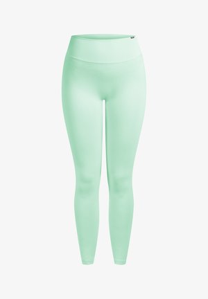 Mintgrønne leggings med høj talje, glat tekstur og tætsiddende design, velegnet til træningstøj eller afslappet tøj.