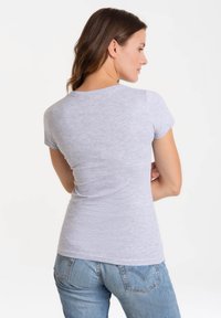 Gray, short-sleeve T-shirt in a soft, lightweight material with a round neckline, fitted design, and smooth texture.