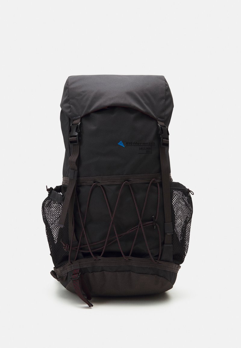Black backpack with a roll-top closure, elastic cord detail, and mesh side pockets. Features a blue brand logo and sturdy straps.