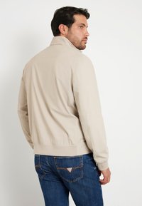 Guess Lengva striukė - beige