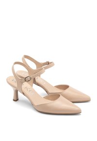 Nude nahka slingback-kengät, joissa on terävät kärjet, 5 cm lohkokorko, säädettävä nilkkahihna soljella ja sileä pinta.