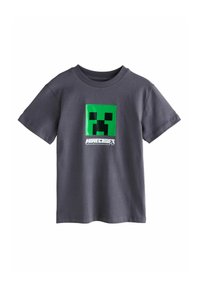 T-shirt en coton gris avec un design de creeper vert sur un graphique carré, et le texte "Minecraft" en blanc en dessous. Manches courtes et col rond.