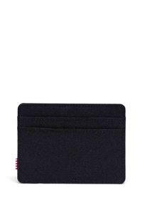 Black fabric card holder with four slots, flat design, textured surface, and a small red-and-white striped label on the side.