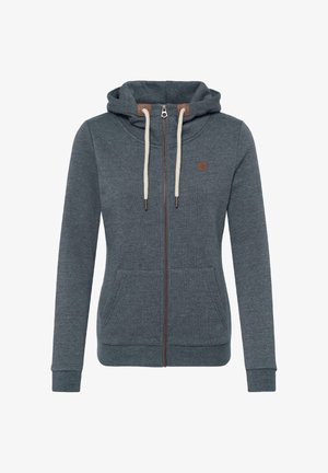 Kapucar z zadrgo iz temno sive tkanine z gladko teksturo, bež vrvicami za zategovanje in dvema sprednjima žepoma z majhnim logotipom.