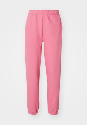 Rosa Jogginghosen aus weichem Baumwollmix, mit einem elastischen Bund und taillierten Bündchen an den Knöcheln für eine bequeme Passform.