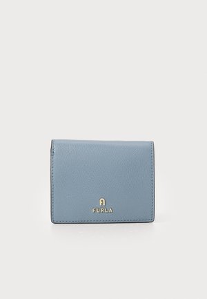 Light blue leather wallet featuring a textured finish, fold-over design, and a gold logo accent on the front. Compact and rectangular shape.