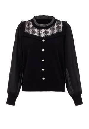 Pulover negru tricotat, cu o cușcă de dantelă brodată transparentă, guler volan și mâneci lungi din chiffon. Dispune de nasturi decorativi pe toată lungimea frontală.