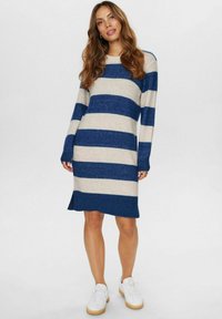 Striped knit dress featuring wide blue and cream stripes, crew neckline, and long sleeves. Textured material with side slits at the hem.