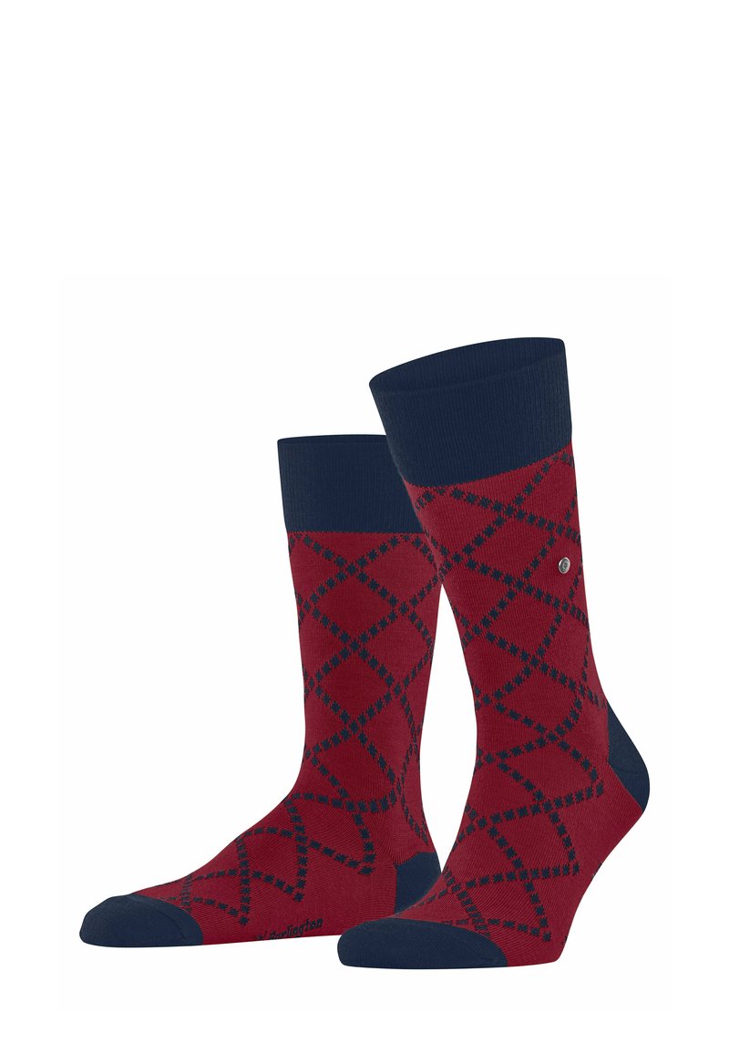Chaussettes rouges avec un poignet marine, ornées d'un motif en diamant bleu marine et vert. Fabriquées en mélange de coton de poids moyen pour le confort.
